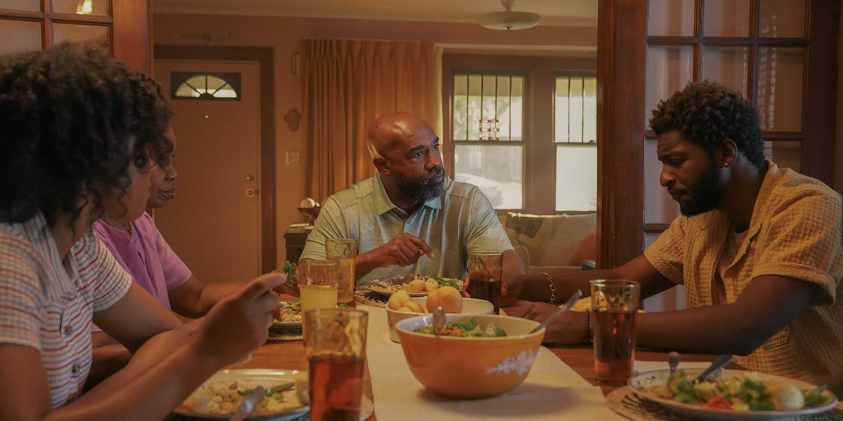 Mark having a serious conversation with his family in Tulsa King