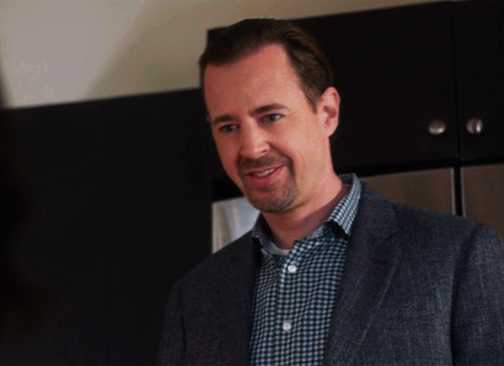 McGee looking confused in his kitchen talking to Delilah in NCIS