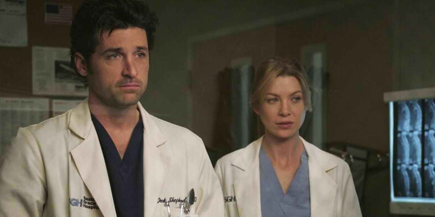 meredith and derek standing in the hospital in grey's anatomy