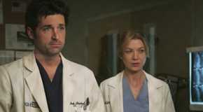 meredith and derek standing in the hospital in grey's anatomy