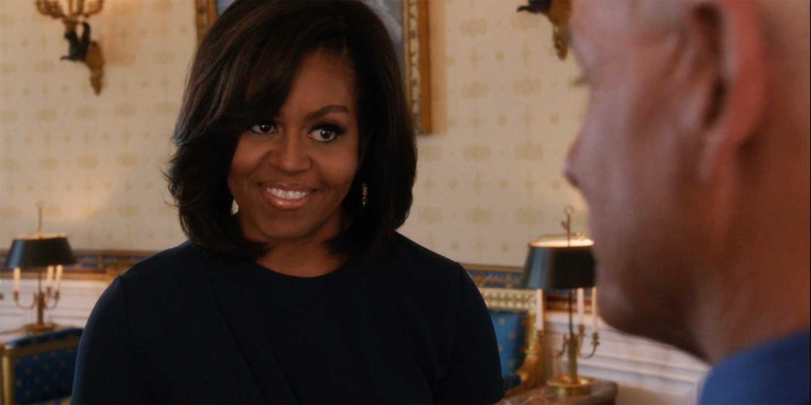 Michelle Obama smiles talking to Gibbs in NCIS