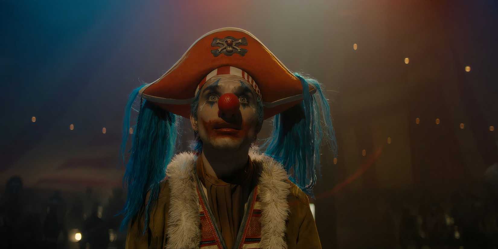One Piece's Buggy the Clown looks up while under the lights of a circus.