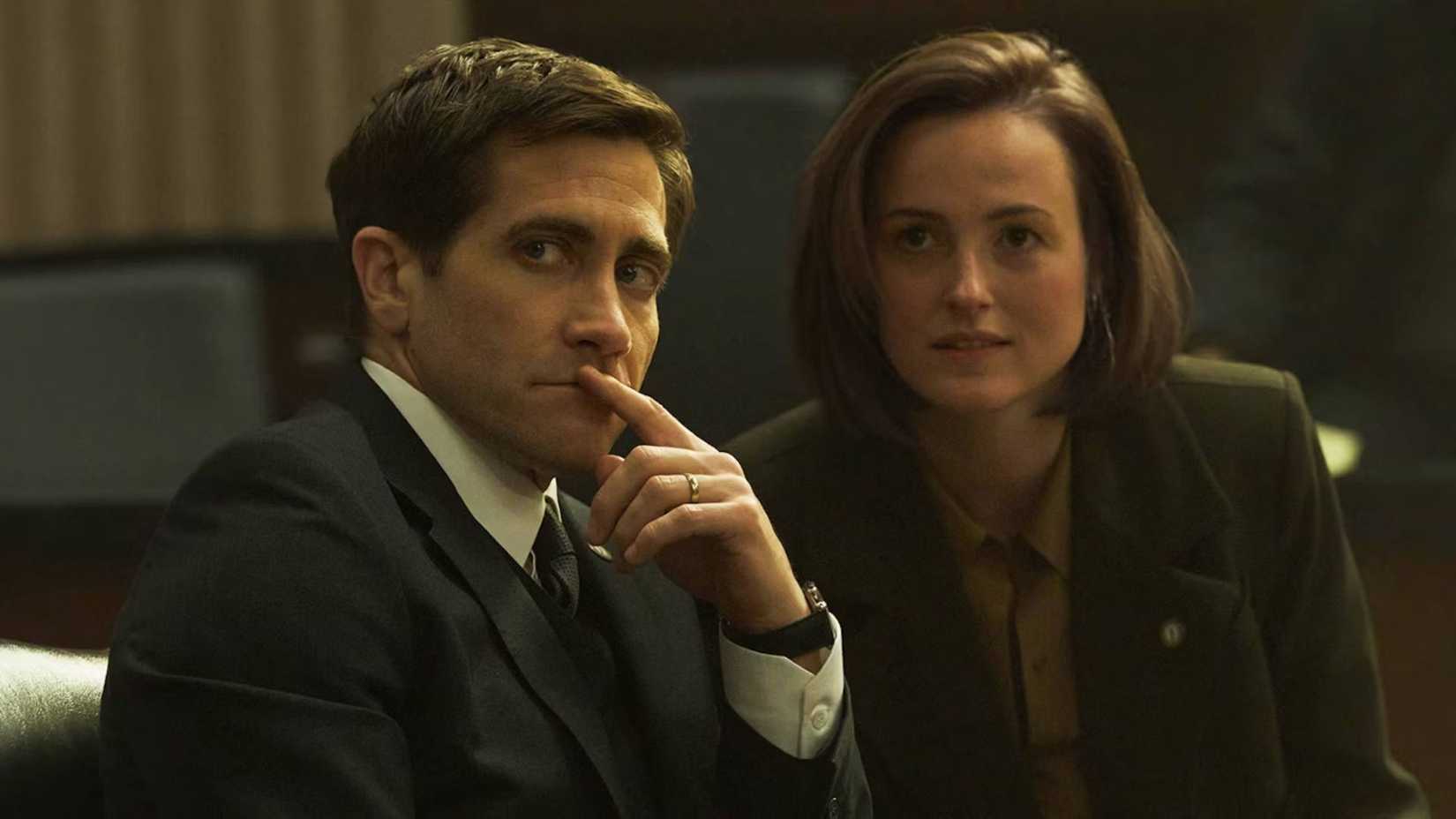Jake gyllenhall and renate reinsve stare toward the camera in Presumed Innocent (2024)