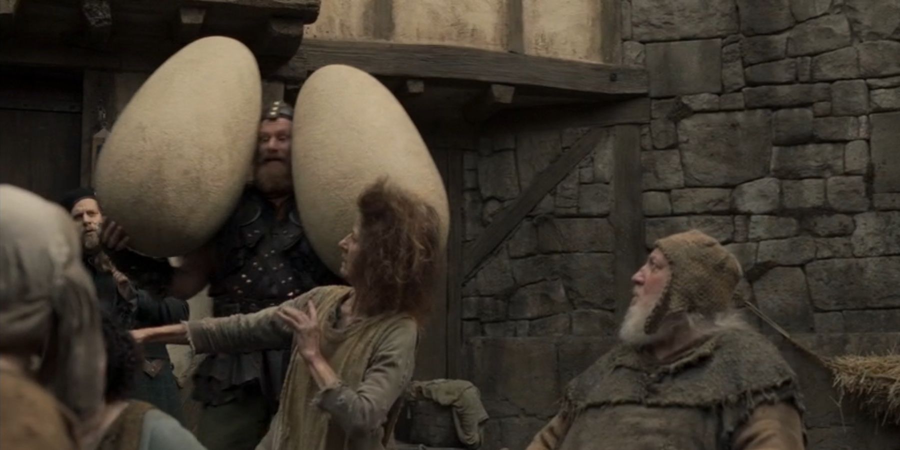 Rune Temte As Bittelig Carrying Dinosaur Eggs In Time Bandits 2024.jpg