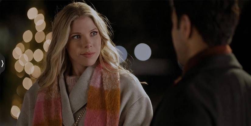 Samantha Brown dressed for winter in a Christmas movie