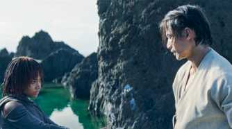 Qimir (Manny Jacinto) and Osha (Amandla Stenberg) speaking on the Unknown Planet in The Acolyte season 1 episode 6