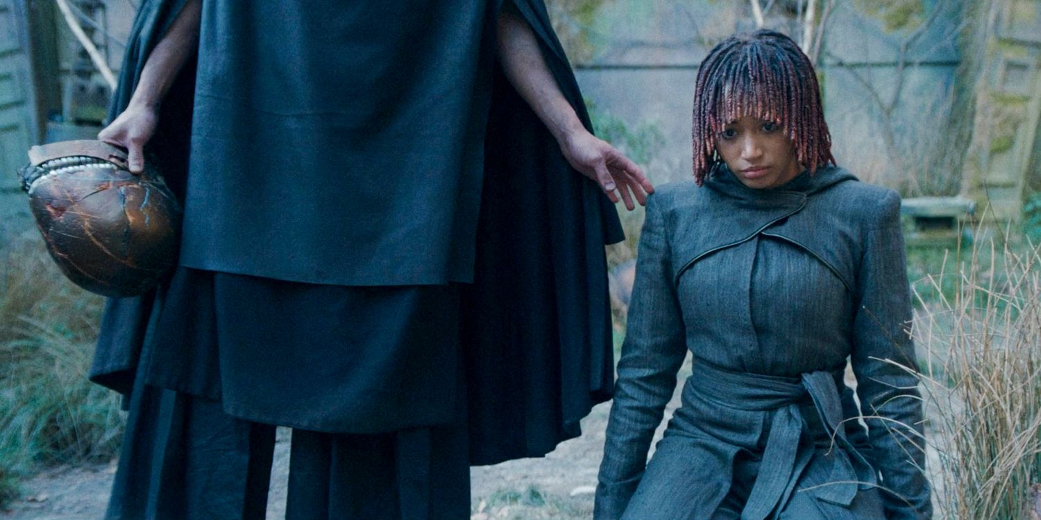 Qimir touching Osha's (Amandla Stenberg) shoulder after having killed Master Sol in The Acolyte season 1 episode 8