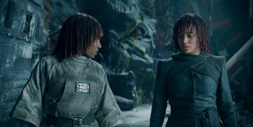 Mae (Amandla Stenberg) and Osha (Amandla Stenberg) in the witch's fortress in Brendok where they lived as children in The Acolyte season 1 episode 8