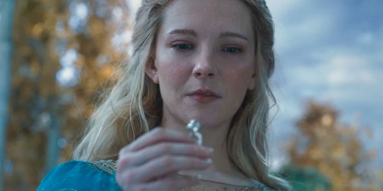 Galadriel (Morfydd Clark) holding a ring in The Lord of the Rings:The Rings of Power Season 2