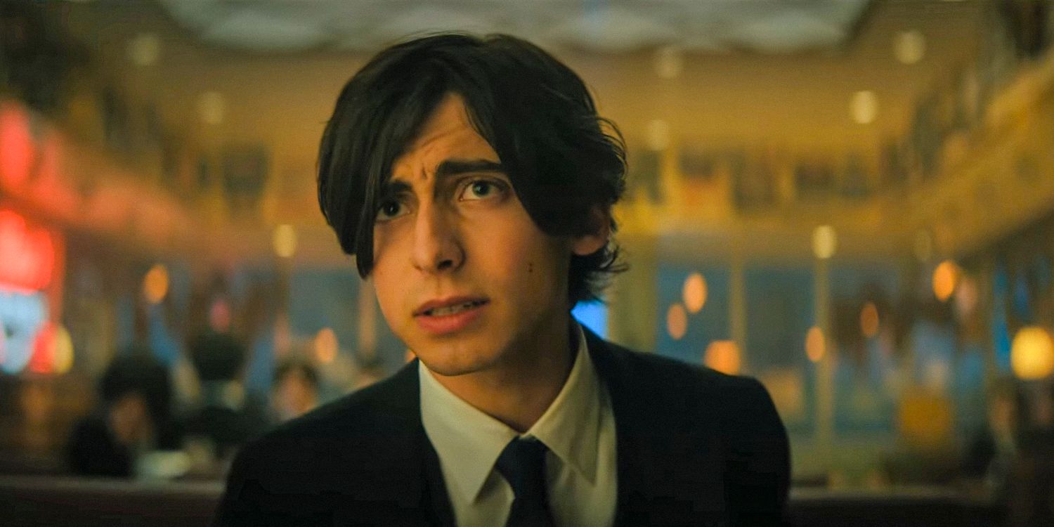 Aidan Gallagher as Five looking worried in The Umbrella Academy.