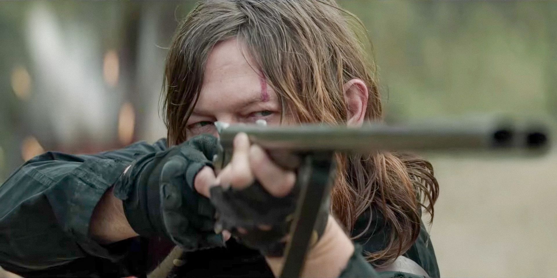 Daryl Dixon (Norman Reedus) aiming a rifle in The Walking Dead: Daryl Dixon Season 2 Trailer