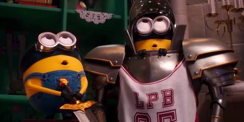 Two Minions in Medieval Garb Look Up in Awe in Despicable Me 4