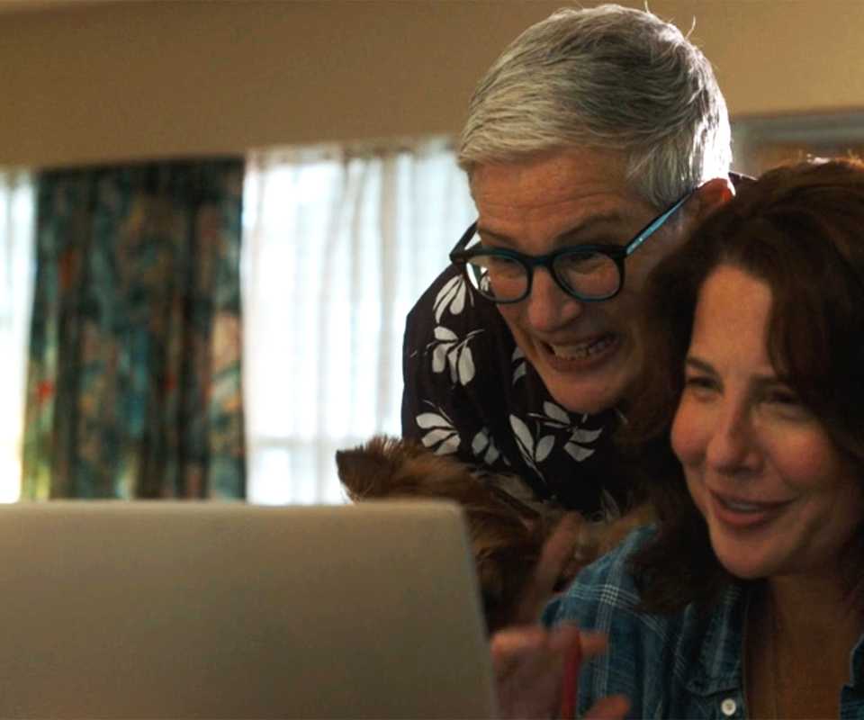 Velma and Teddi are looking at the computer in Tracker.