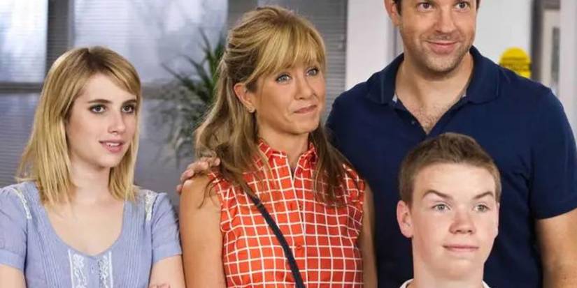 Will Poulter, Jennifer Aniston, Jason Sudeikis, and Emma Roberts stand together, smiling at something off-camera