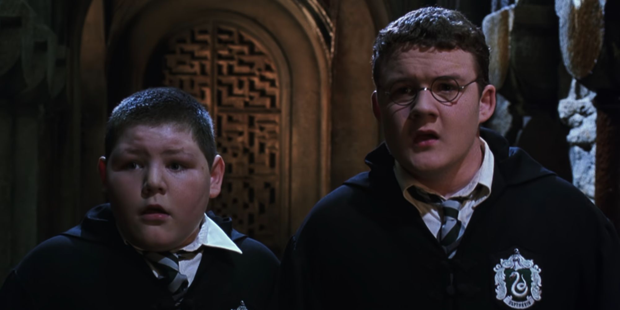 Crabbe and Goyle looking concerned in Harry Potter and the Chamber of Secrets