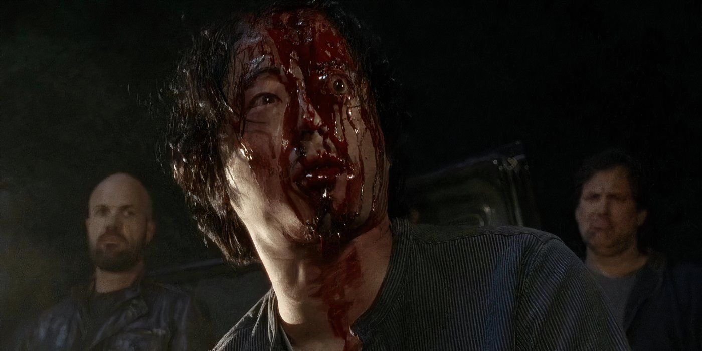 Glenn (Steven Yeun) looking injured with blood pouring down his face in The Walking Dead