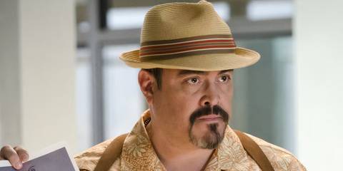 Batista in a yellow hat in Dexter