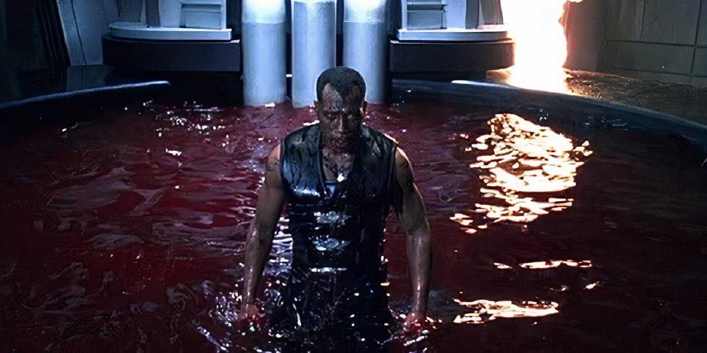 blade-emerges-from-a-pool-of-blood-in-blade-ii 8 Superhero Movies That Are Basically Horror Films, Ranked