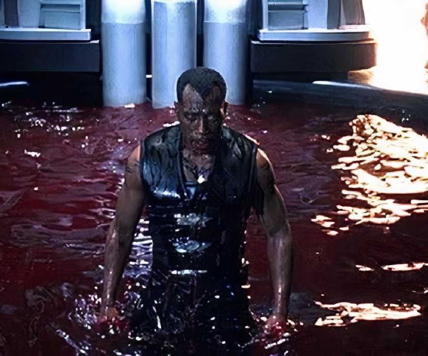 Blade emerges from a pool of blood in Blade II