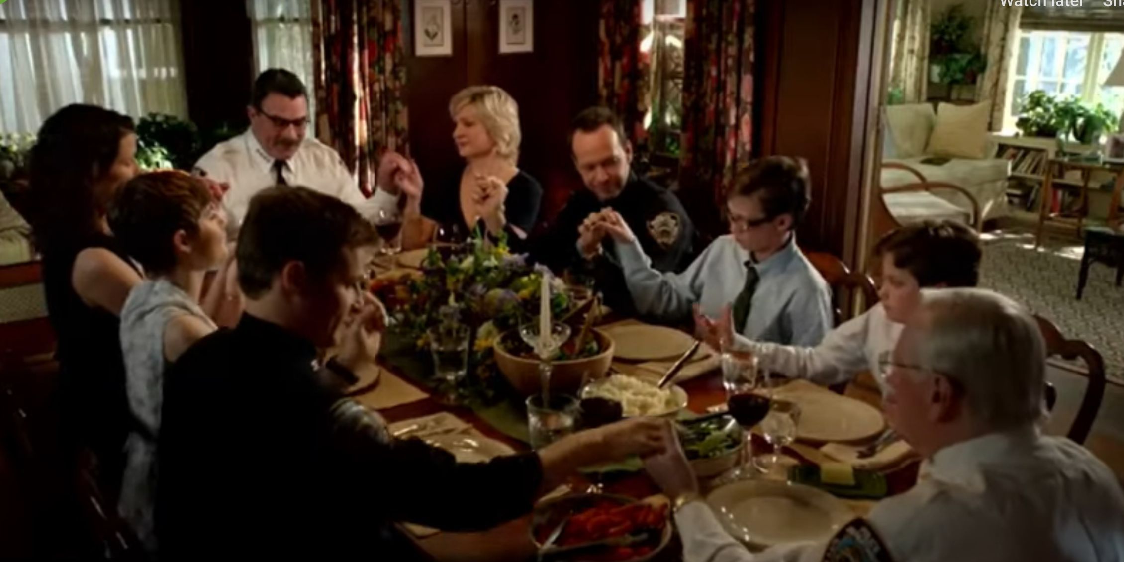 Blue Bloods everyone holding hands to say Grace at the Reagan family dinner 