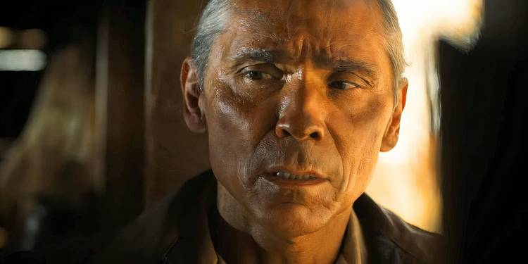 Close-up of Joe Leaphorn looking wary in the Dark Winds season 1 finale