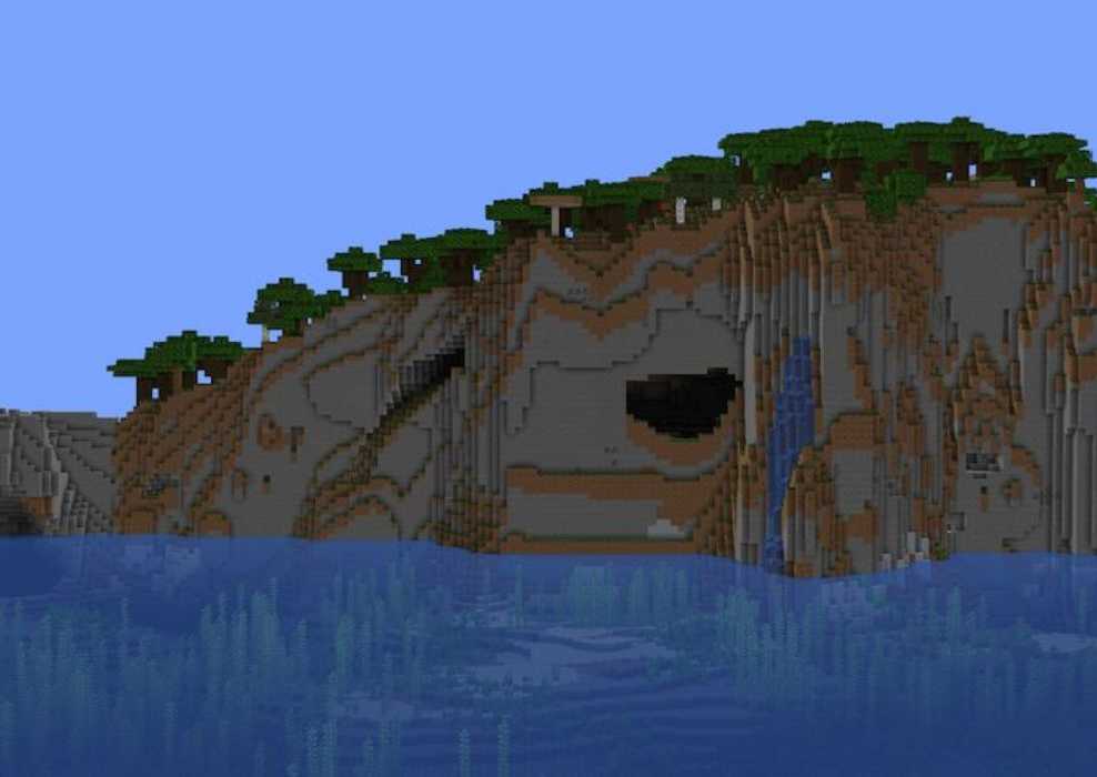 Large island with a Dark Forest biome full of Mushroom trees on top of cliffs in Minecraft.