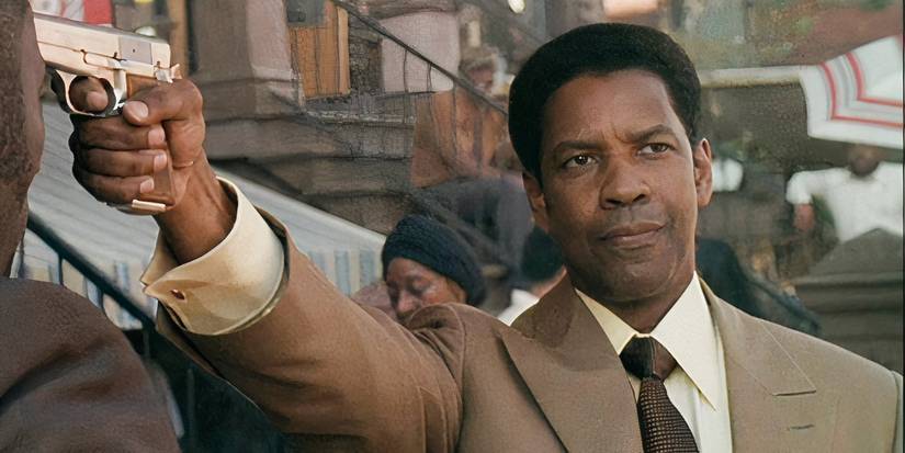 Denzel Washington mengarahkan pistol di American Gangster