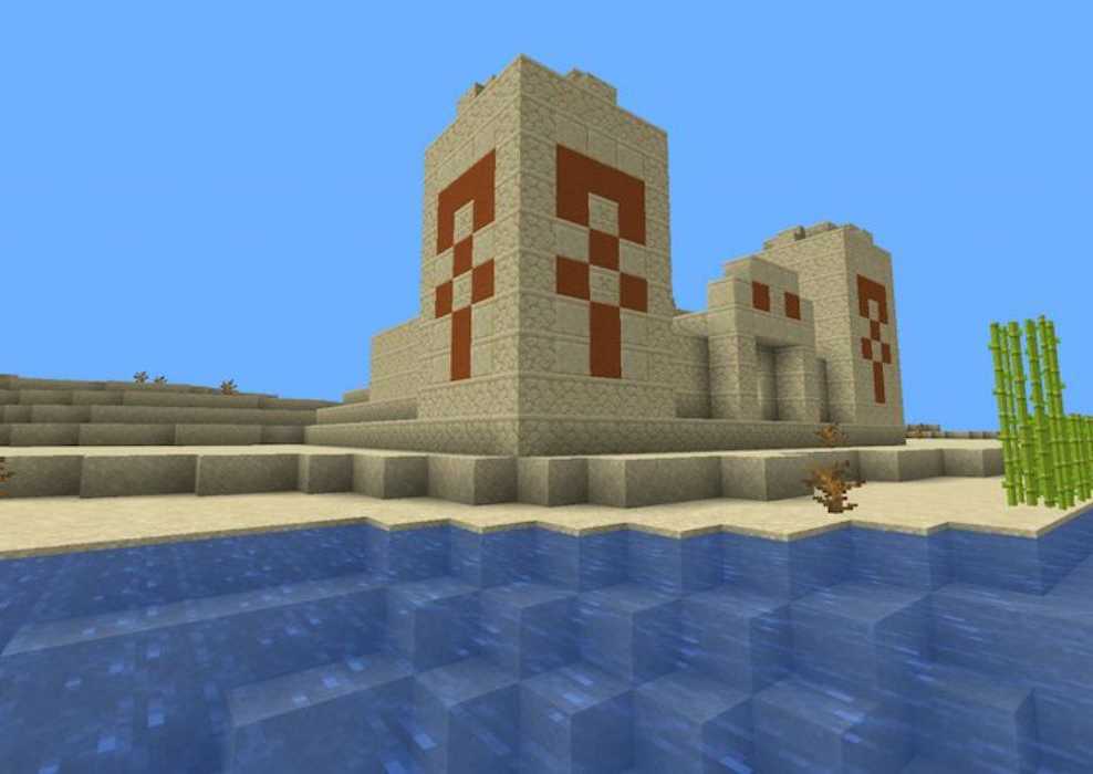 Desert island surrrounded by water, with a Desert temple full of loot in Minecraft.