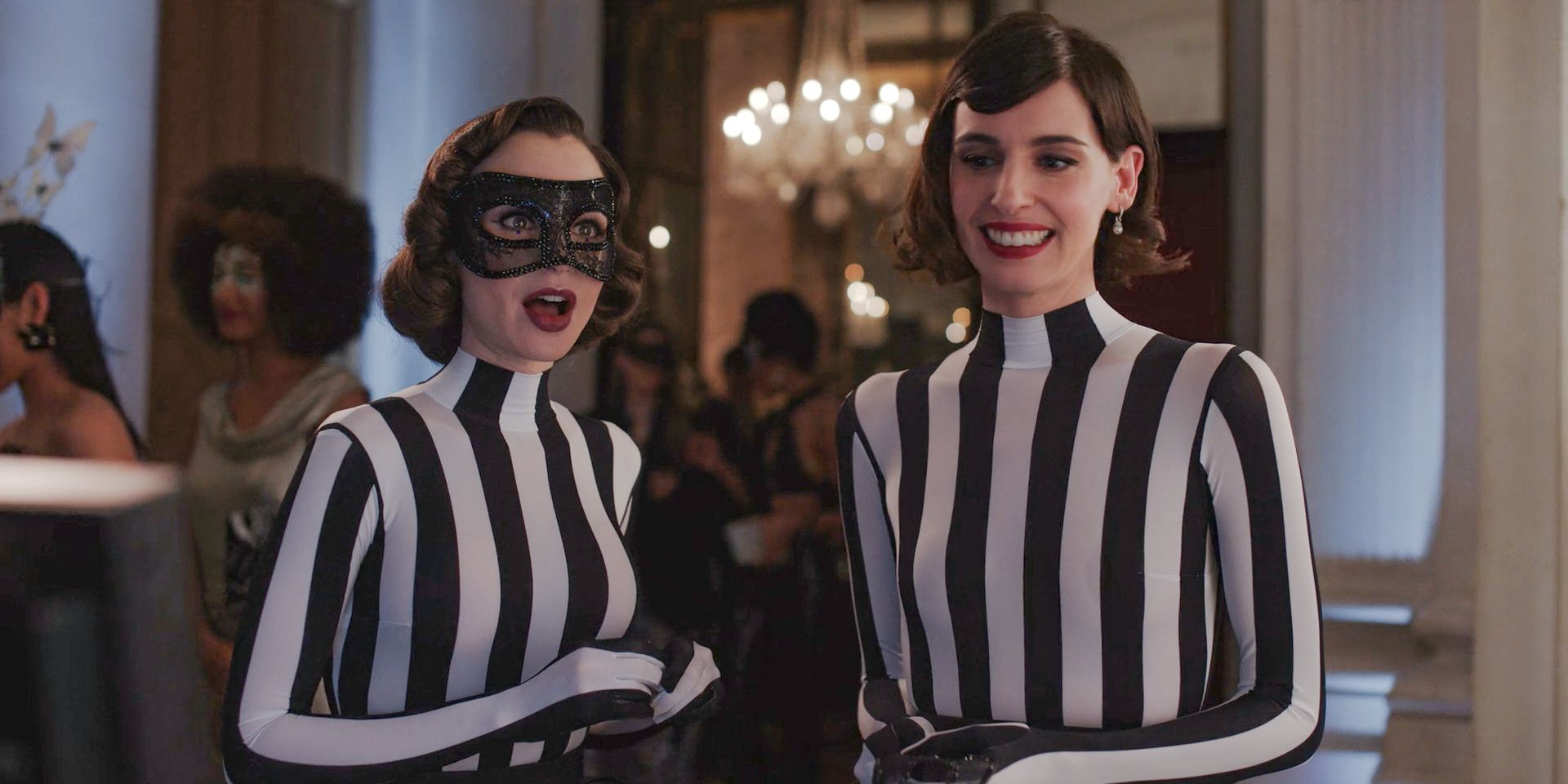 At the masquerade ball, Emily (Lily Collins) and another girl wearing the same outfit in Emily in Paris Season 4