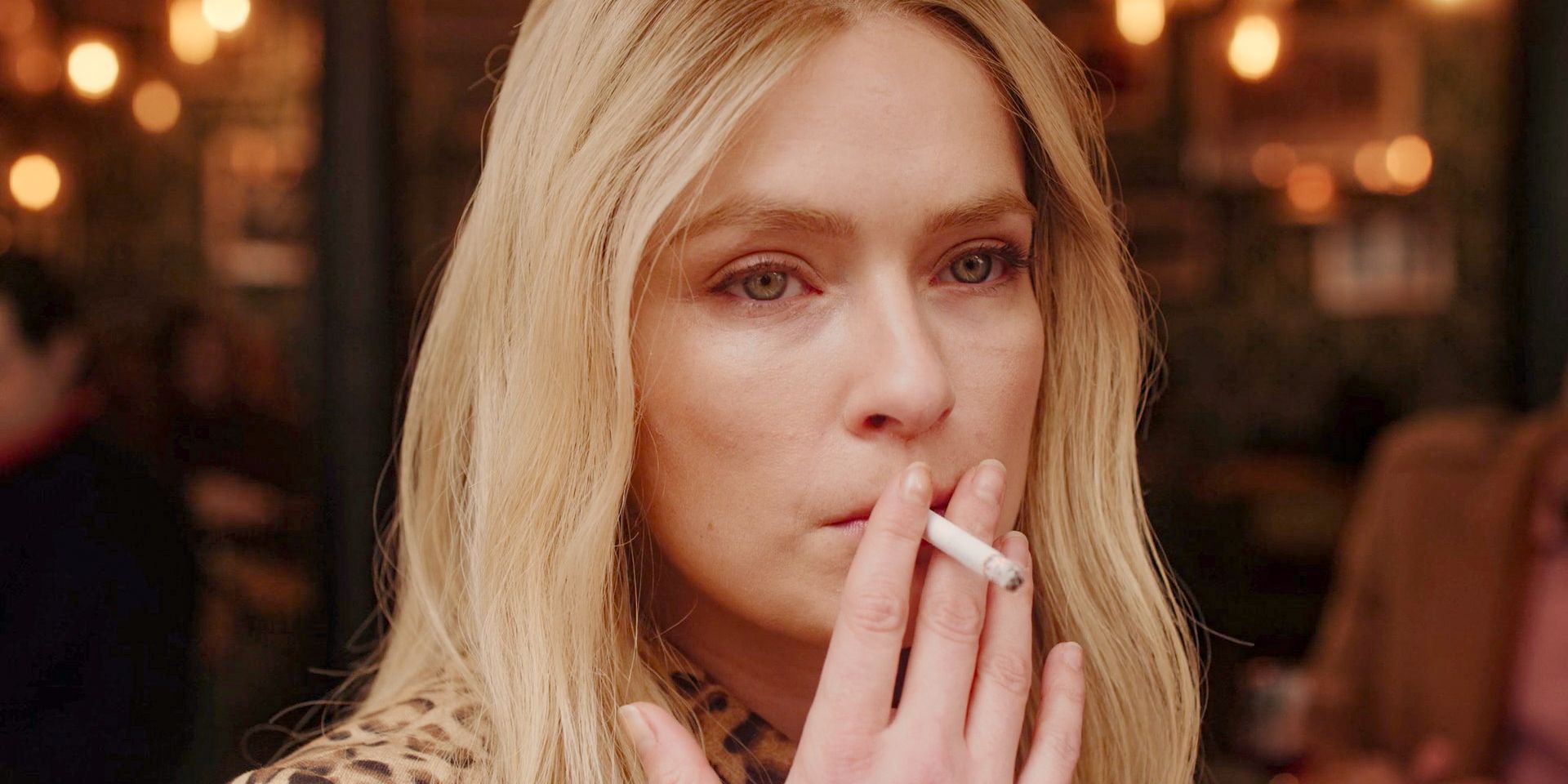 Camille (Camille Razat) smoking anxiously after finding out she is not pregnant in Emily in Paris Season 4