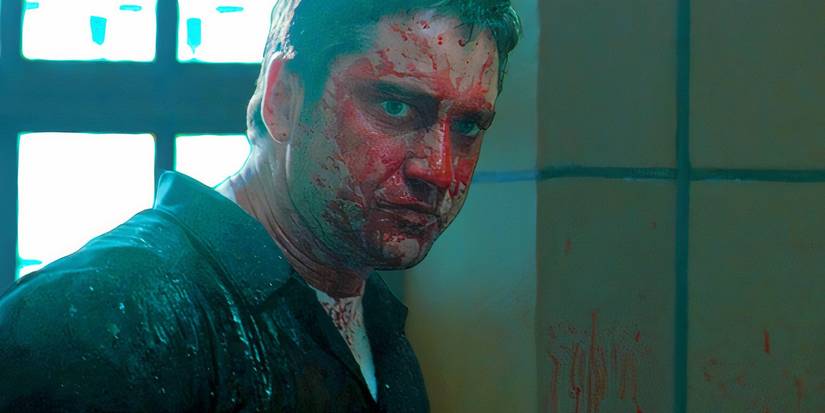 Gerard Butler com o rosto ensanguentado em O Preço da Justiça
