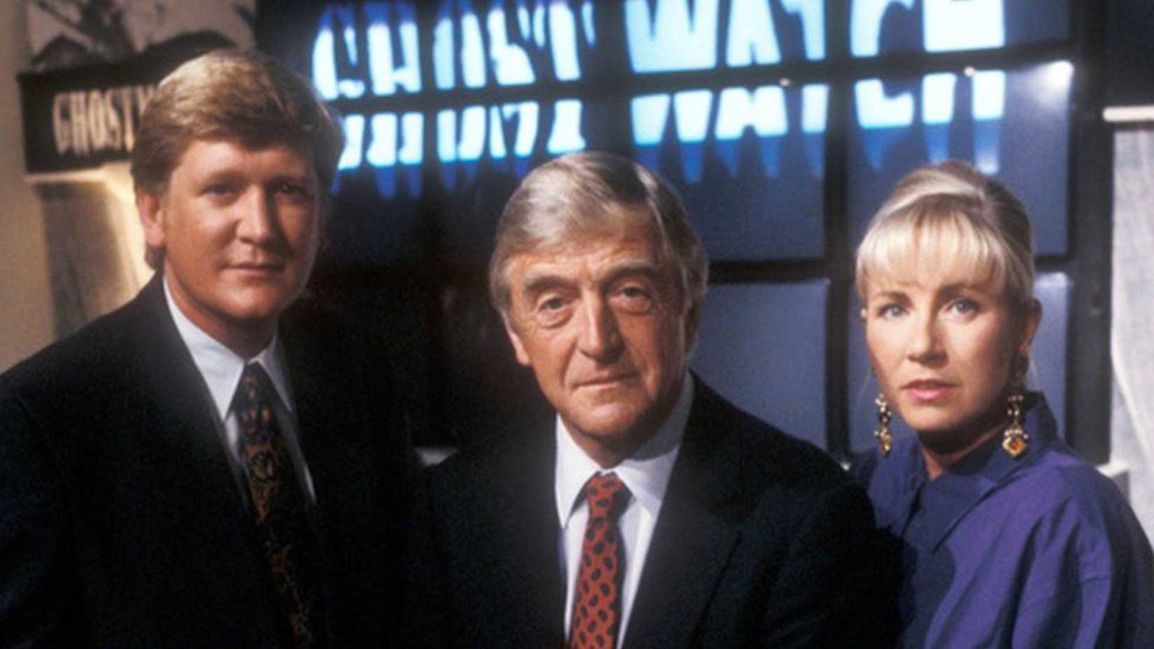 The cast of Ghostwatch looking into the camera from a studio