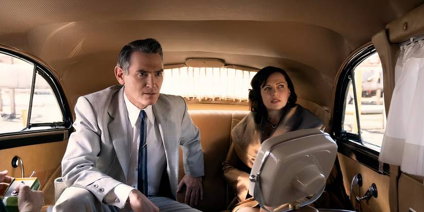 Billy Crudup watches TV in the back of a limo in Hello Tomorrow