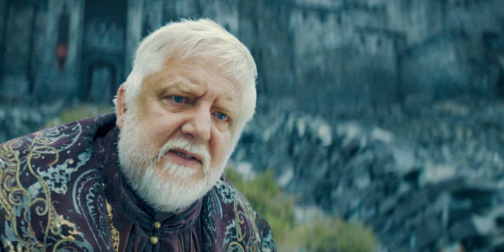 Ser Simon Strong (Simon Russell Beale) receives Rhaenyra in Harrenhal in House of the Dragon season 2 Episode 8