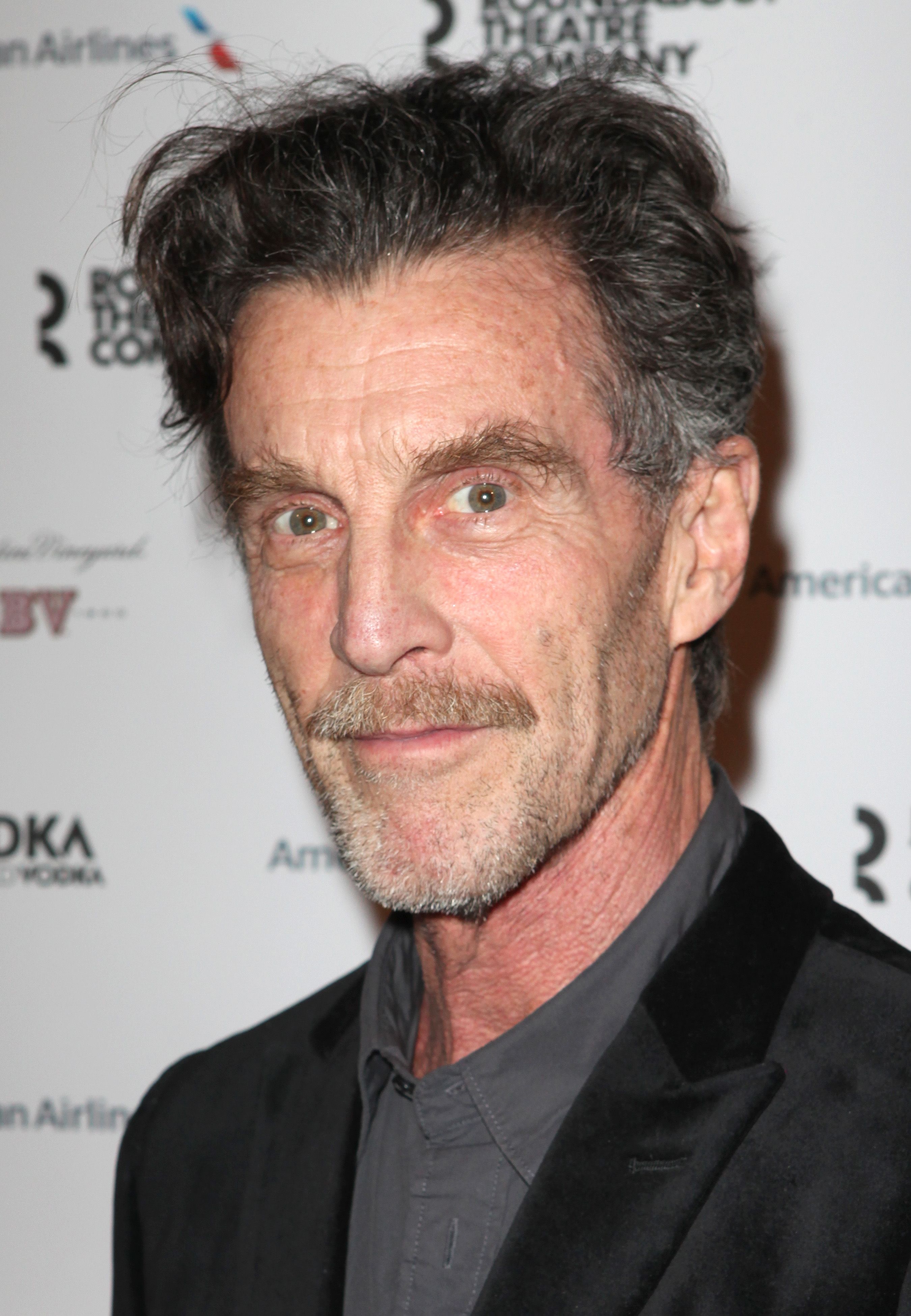 Headshot Of John Glover