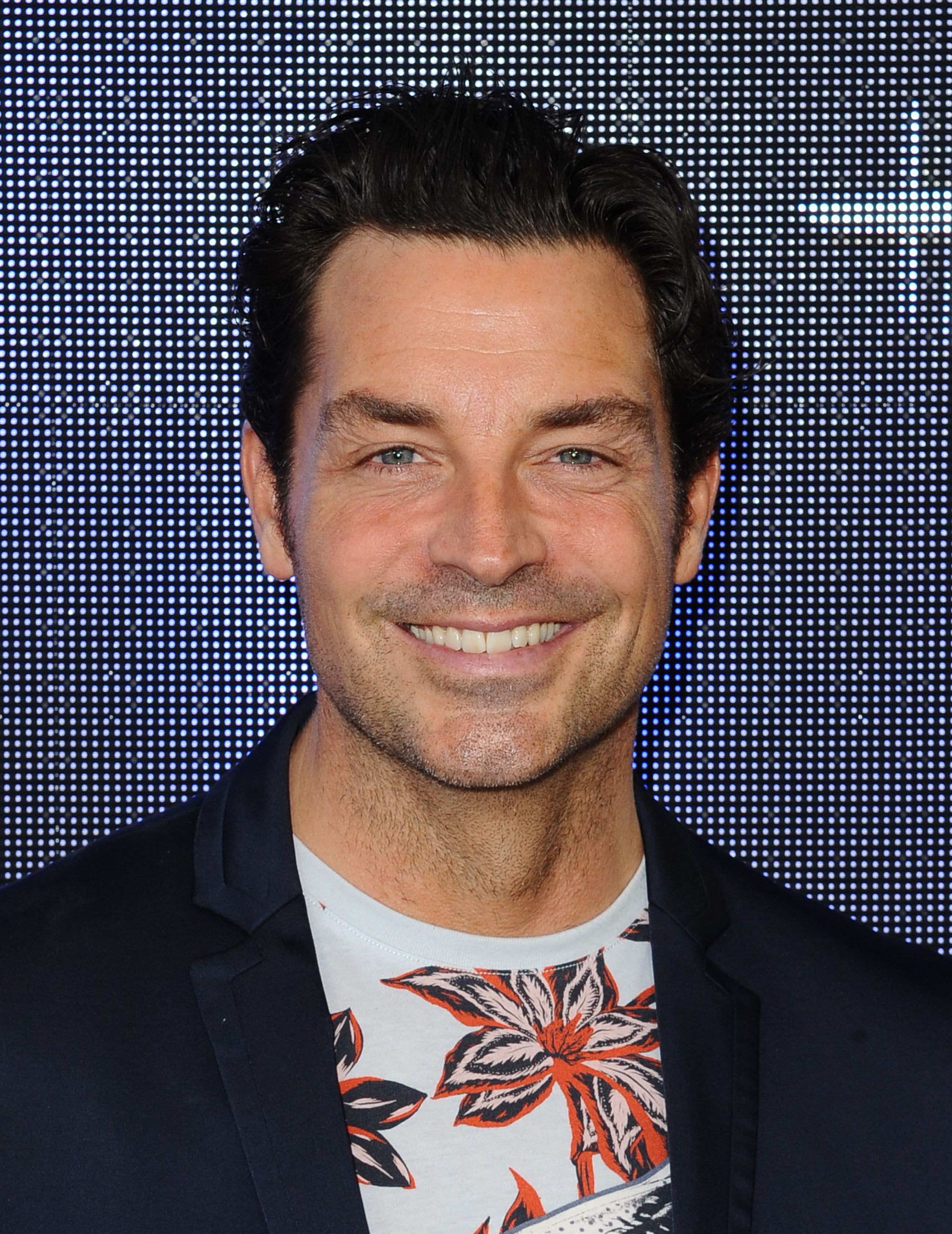 Headshot Of Brennan Elliott