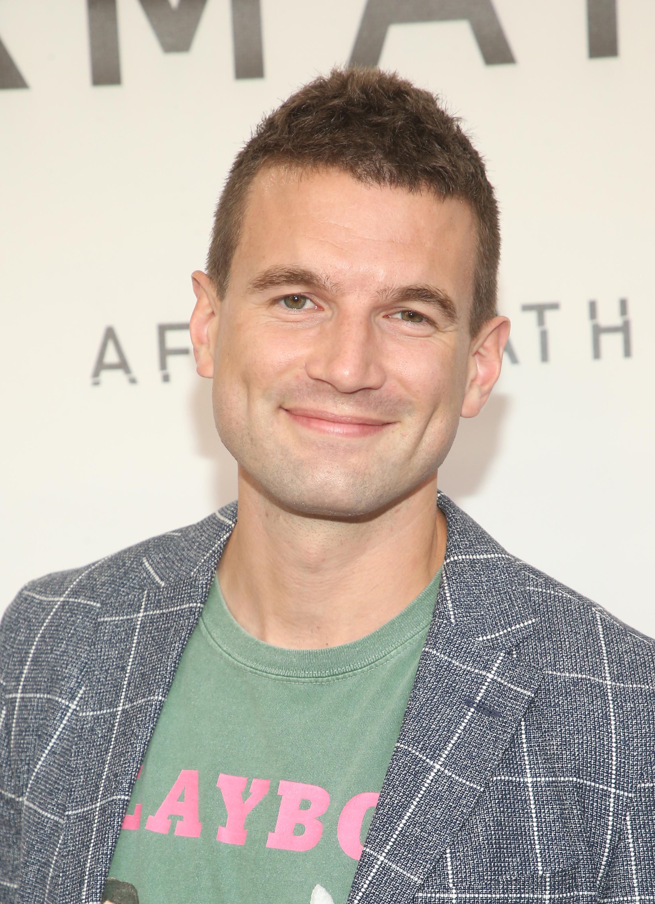 Headshot Of Alex Russell