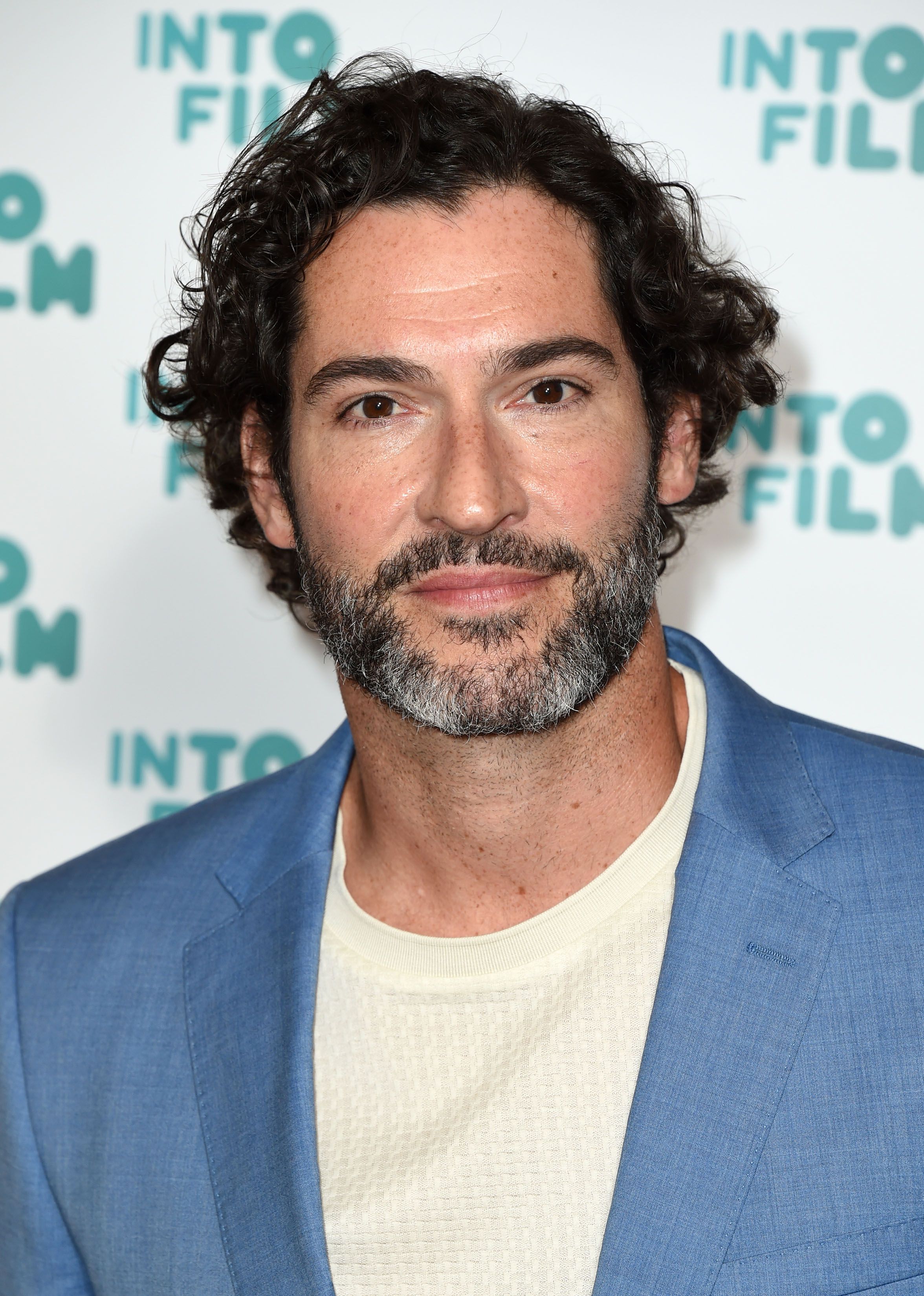 Headshot Of Tom Ellis