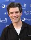 Headshot Of Max Greenfield