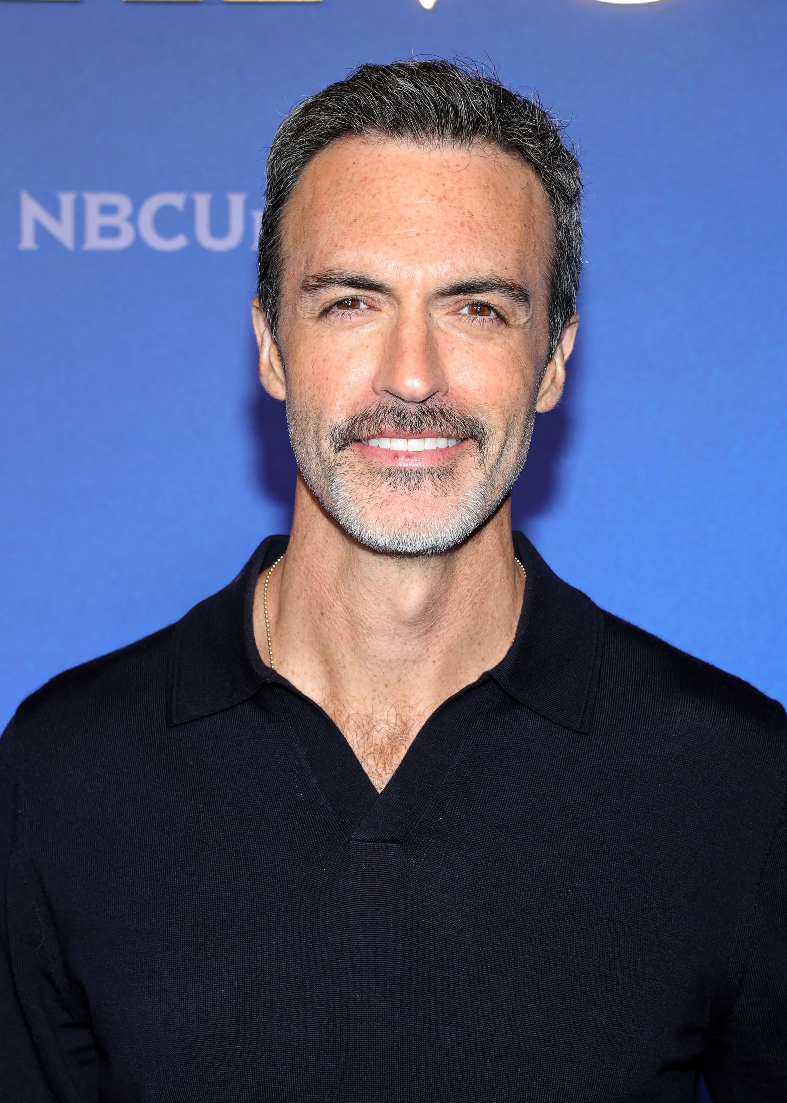 Headshot Of Reid Scott