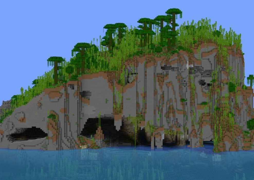 Large island with a Jungle and Bamboo biome on top of stone cliffs in Minecraft.