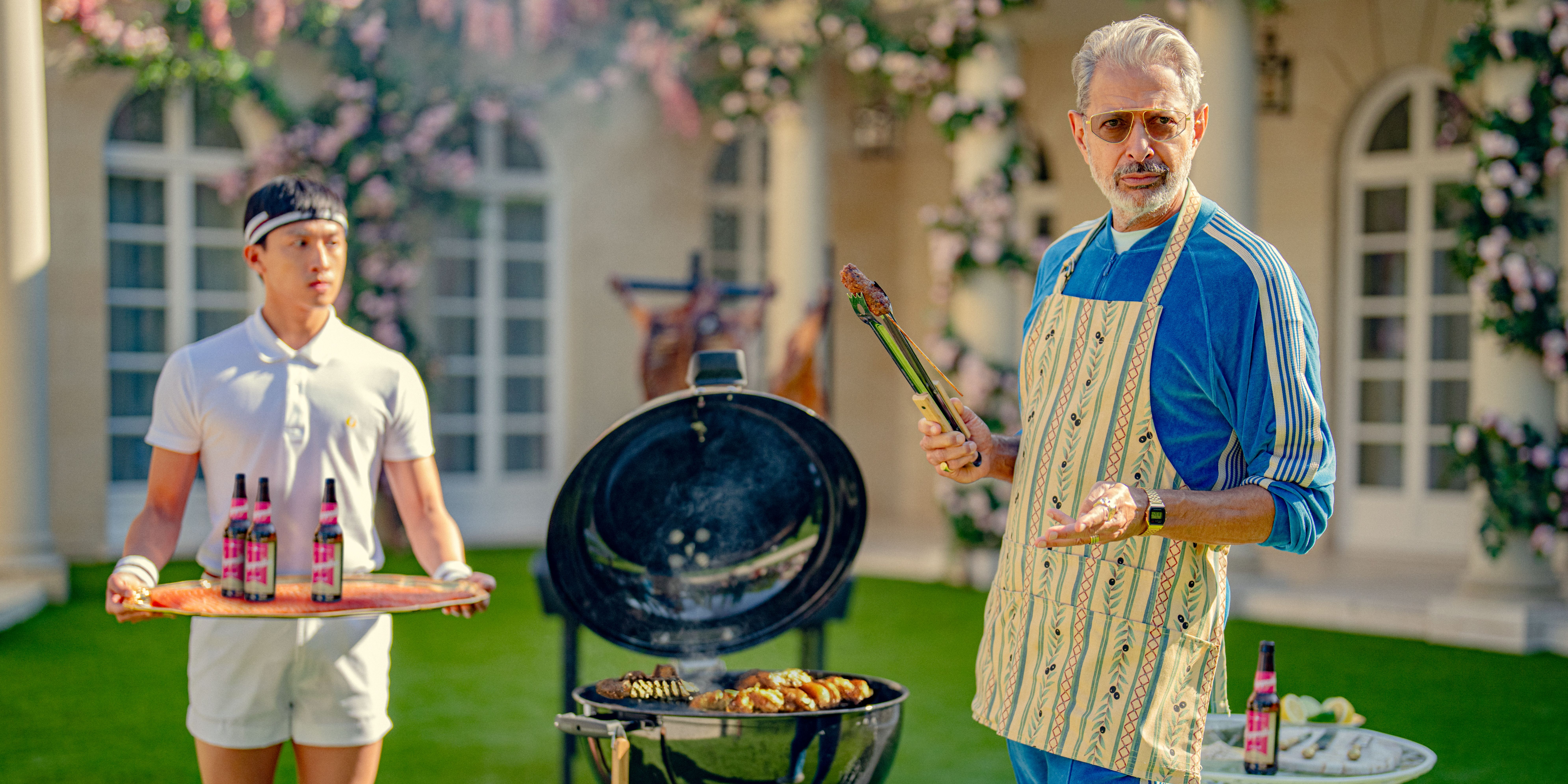 Zeus (Jeff Goldblum) hosting a barbecue in the garden in KAOS Season 1