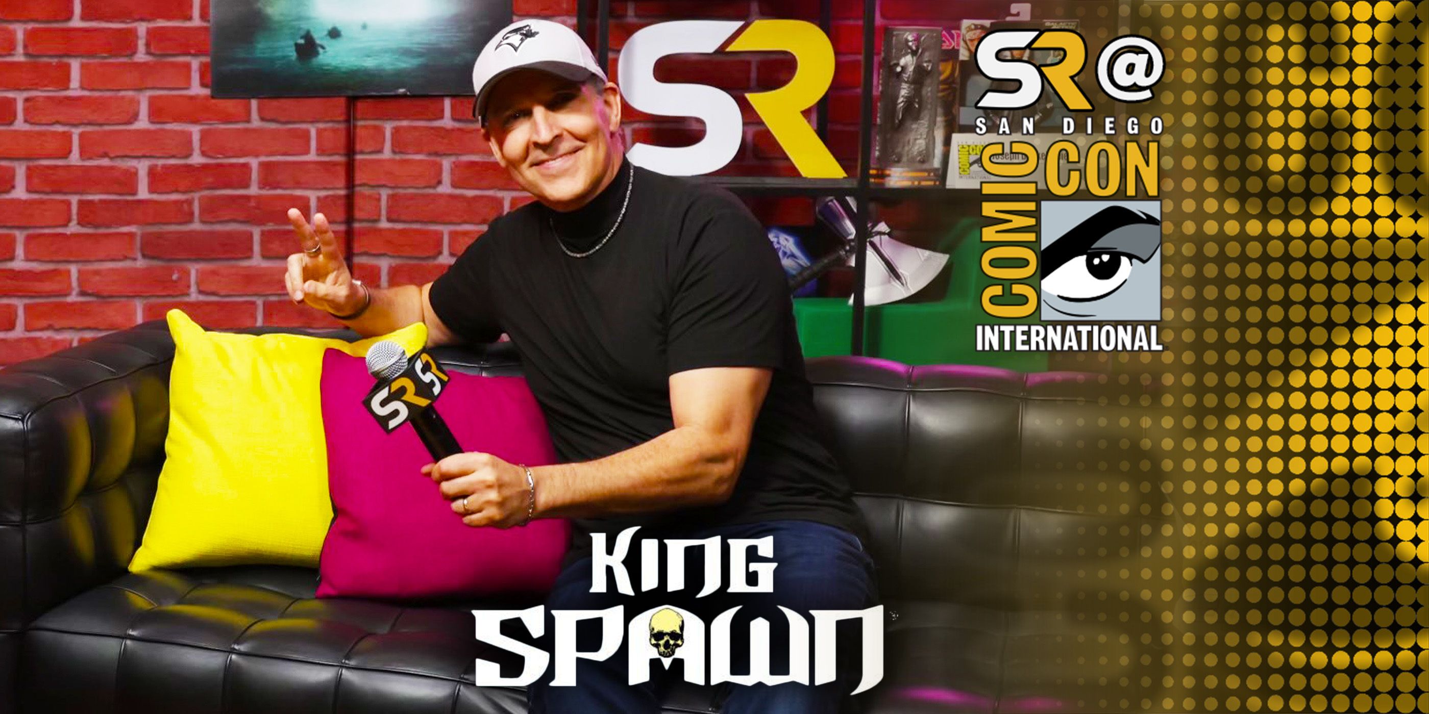 Todd McFarlane sitting on couch in SDCC media suite for Spawn interview