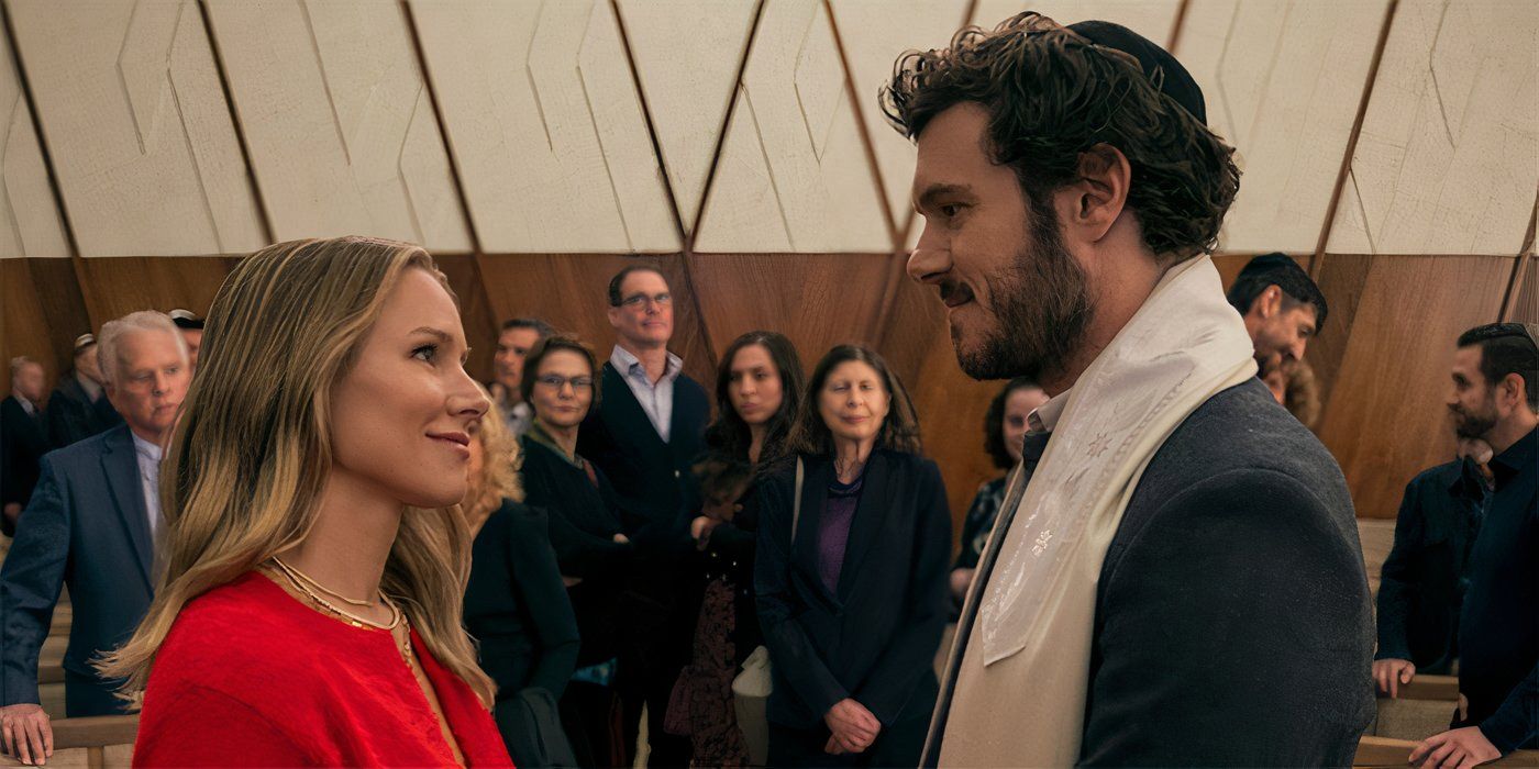 Kristen Bell and Adam Brody smiling at each other in Nobody Wants This