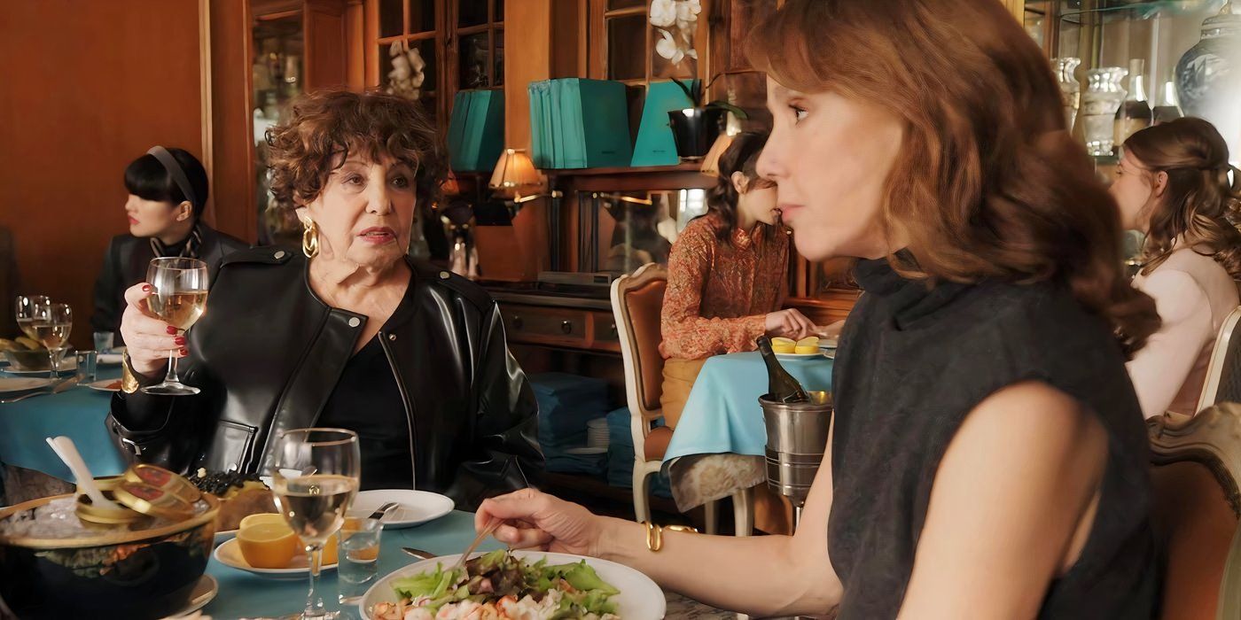 Liliane Rovère as Heloise and Philippine Leroy-Beaulieu as Sylvie chat over lunch in Emily in Paris