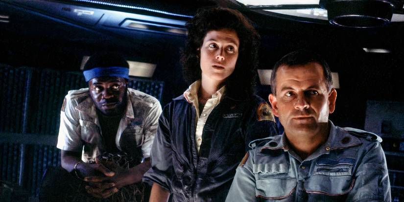 Parker, Ripley, and Ash gathered together in Alien