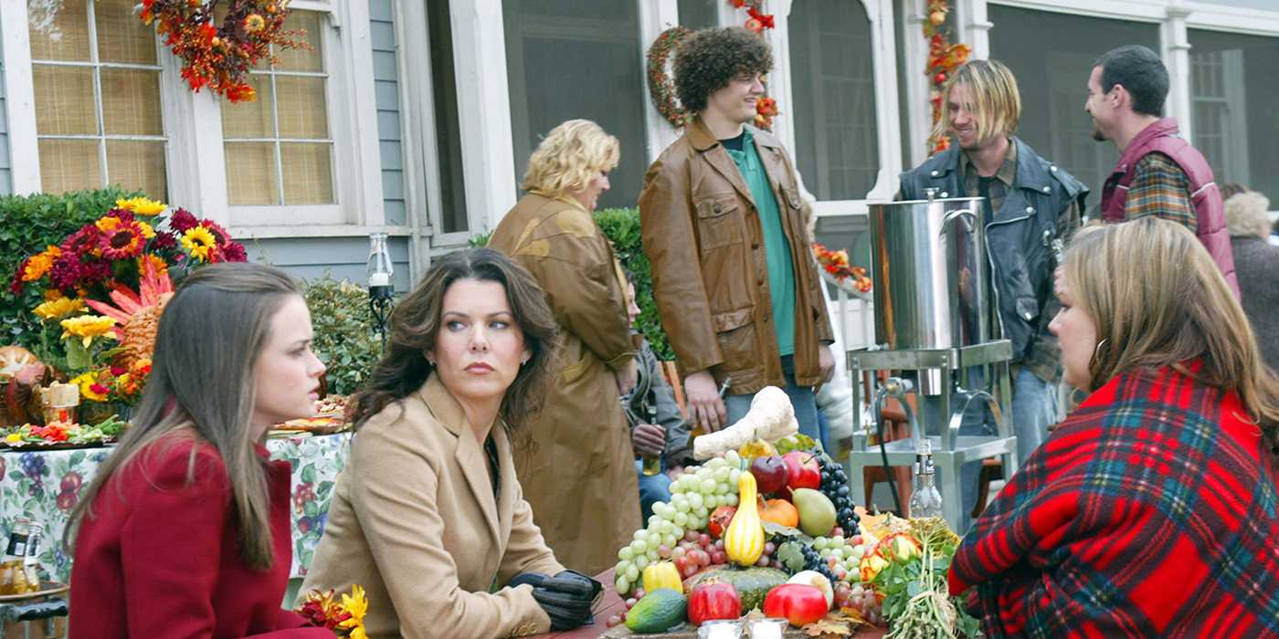 Rory and Lorelai in group on thanksgiving in gilmore girls episode 'A Deep-Fried Korean Thanksgiving'
