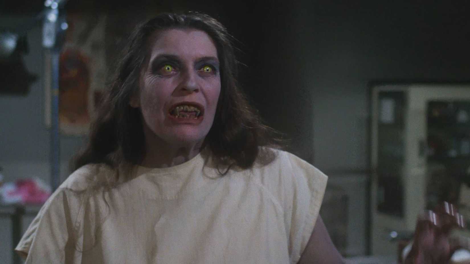 A female vampire coming to life in Salem's Lot.