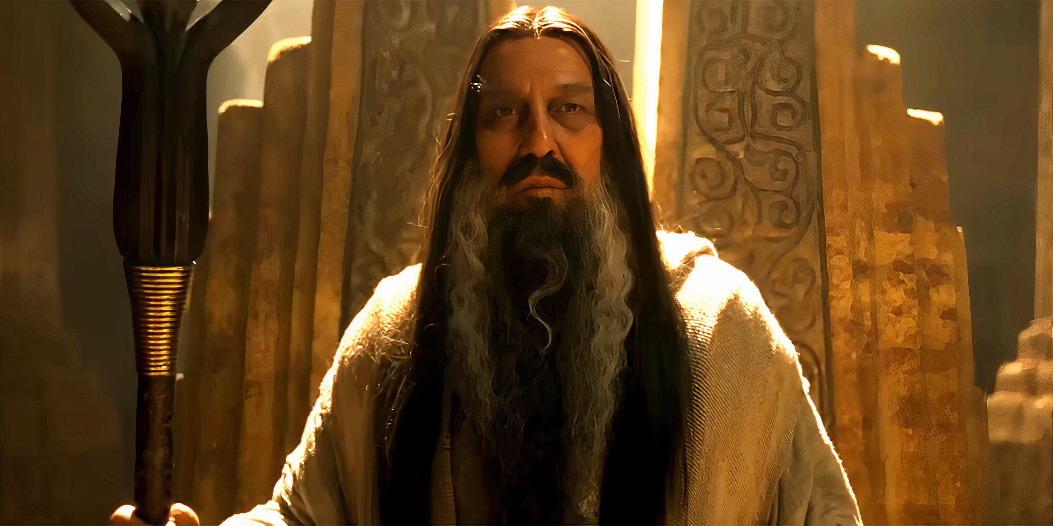 The Dark Wizard holding his staff in The Lord of the Rings: The Rings of Power season 2