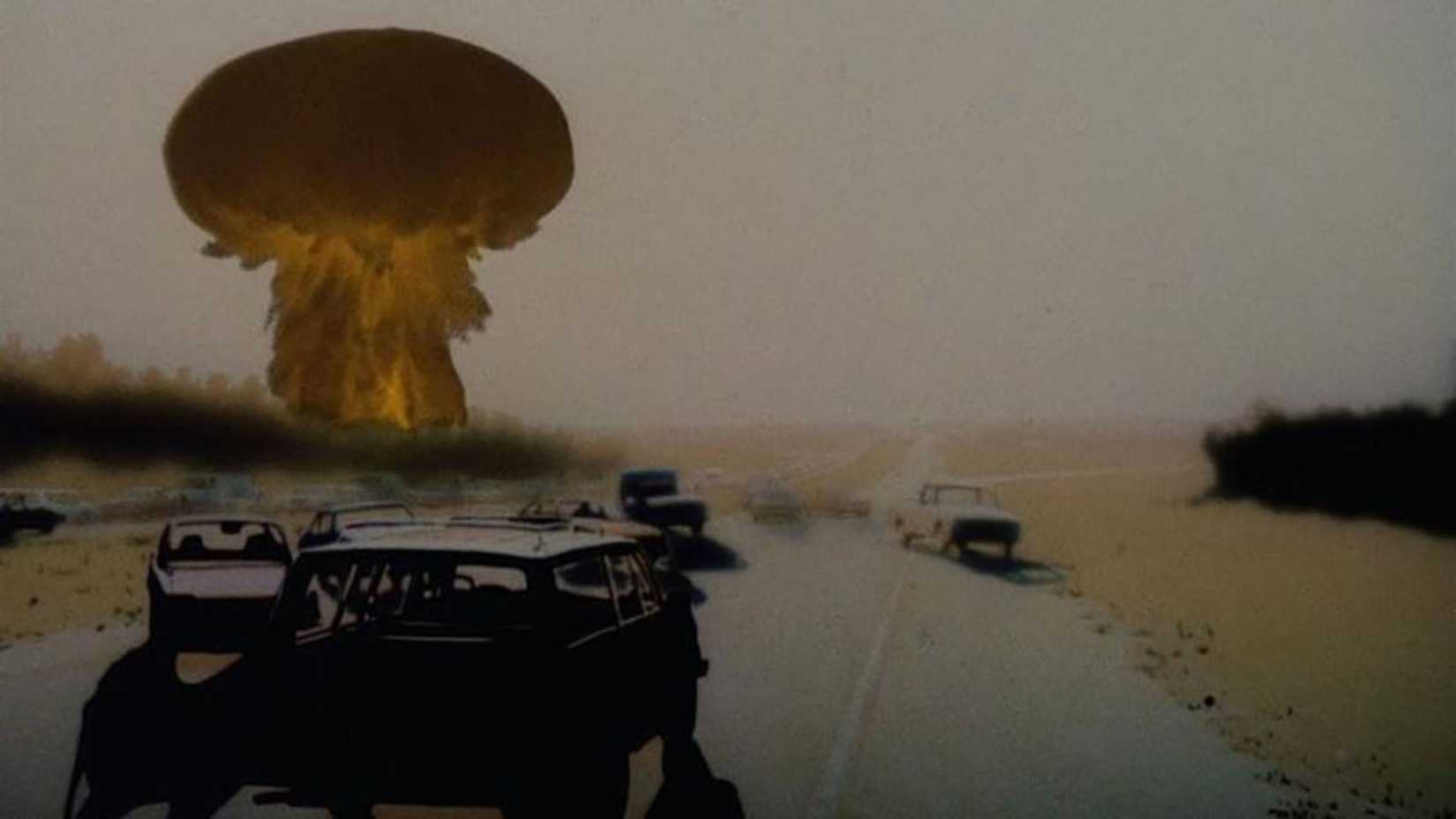 The nuclear explosion occuring behind an abandoned highway in The Day After (1983)